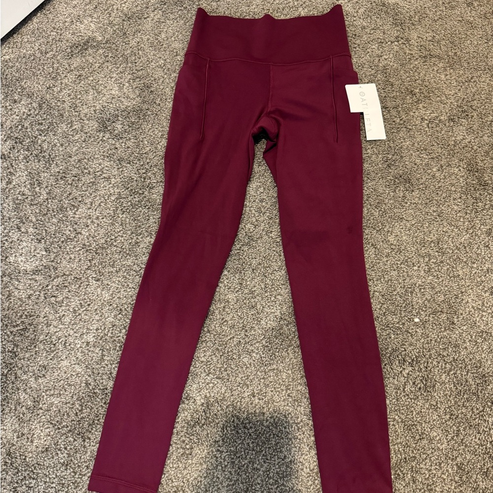Athleta Salutation Stash Tight Burgundy Leggings